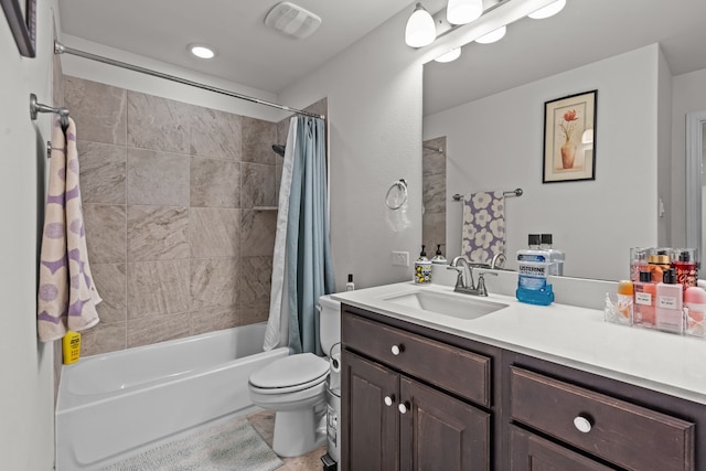 full bathroom featuring vanity, toilet, shower / bathtub combination with curtain, and visible vents