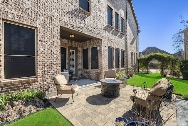 view of patio featuring a fire pit