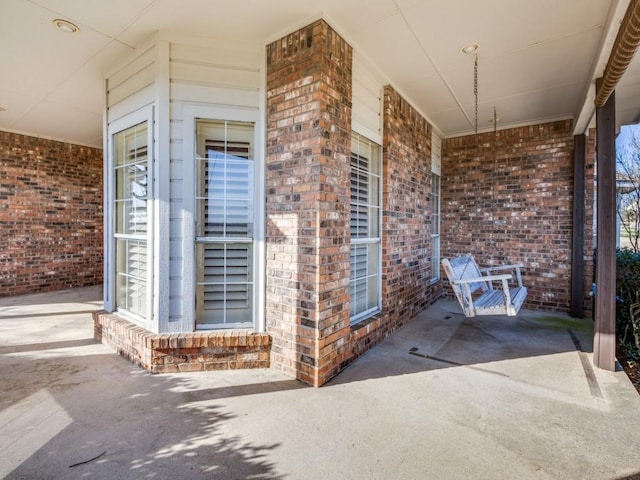 view of patio featuring a porch