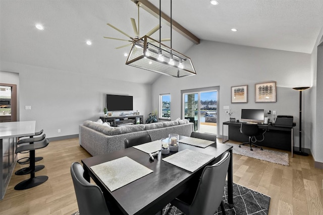 dining space featuring recessed lighting, light wood-type flooring, baseboards, and beamed ceiling