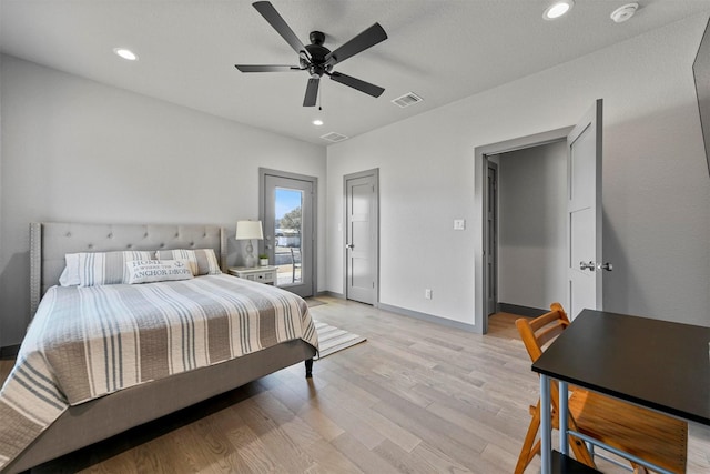 bedroom featuring recessed lighting, visible vents, baseboards, and light wood-style floors