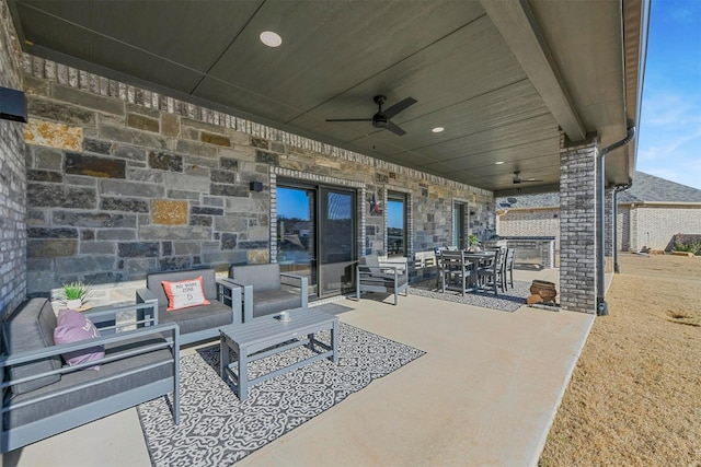 view of patio featuring outdoor lounge area, outdoor dining area, and ceiling fan