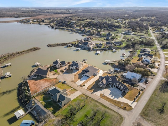 aerial view featuring a water view and a residential view