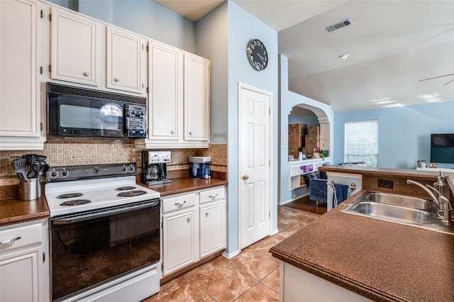 kitchen with visible vents, electric range, a sink, black microwave, and dark countertops