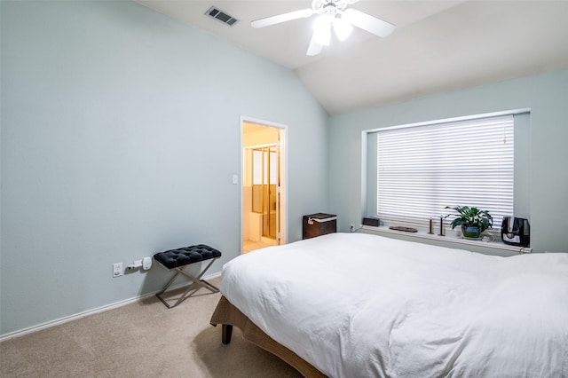 bedroom with visible vents, baseboards, light colored carpet, vaulted ceiling, and a ceiling fan