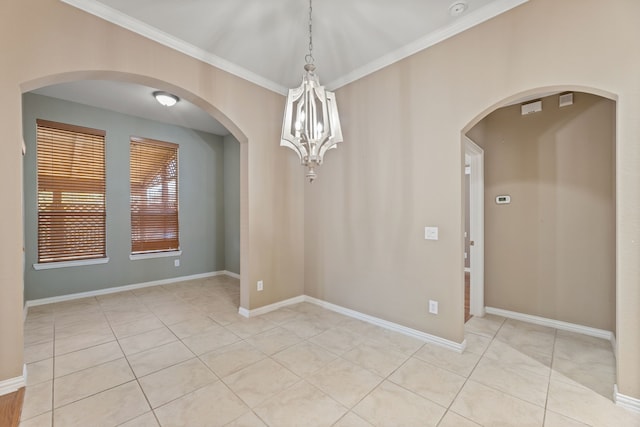 empty room featuring light tile patterned floors, baseboards, an inviting chandelier, and ornamental molding