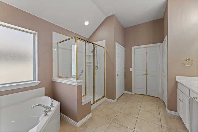 full bath featuring vanity, lofted ceiling, tile patterned flooring, a shower stall, and a bath