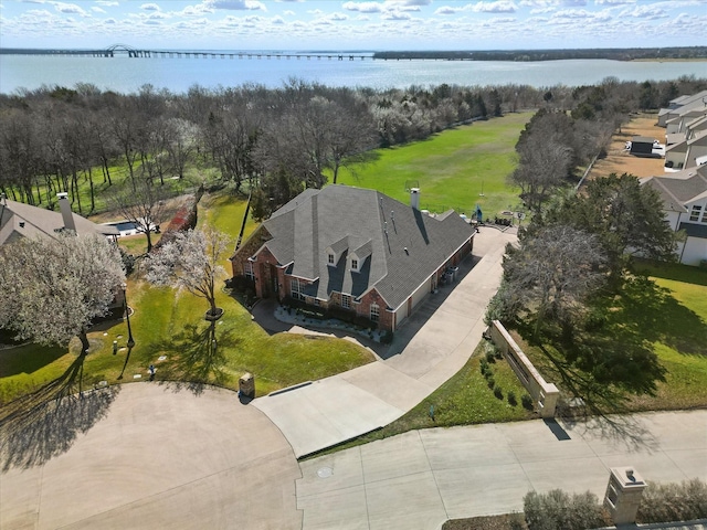 drone / aerial view featuring a water view