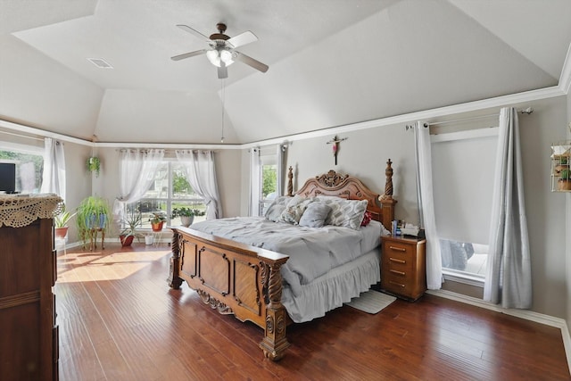 bedroom featuring visible vents, a ceiling fan, dark wood-type flooring, and lofted ceiling