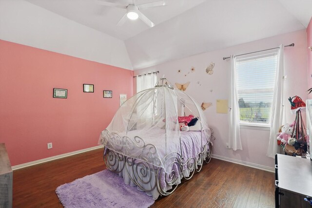 bedroom featuring baseboards, wood finished floors, a ceiling fan, and vaulted ceiling