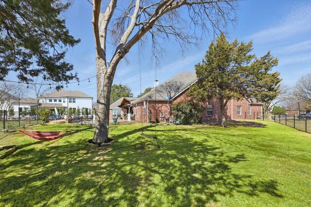 view of yard with fence