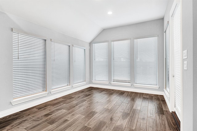 unfurnished sunroom with vaulted ceiling