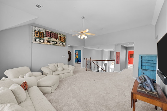 living room featuring visible vents, a ceiling fan, carpet, and vaulted ceiling