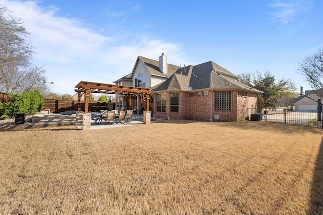 rear view of property with a pergola, a patio, a fenced backyard, brick siding, and central AC unit