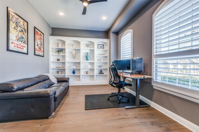 office space with recessed lighting, baseboards, wood finished floors, and a ceiling fan