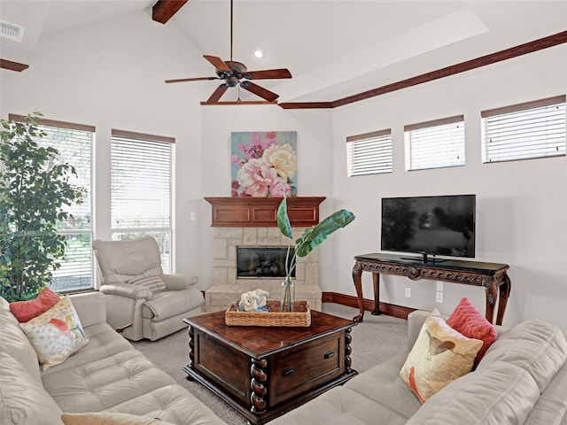 living area featuring visible vents, baseboards, vaulted ceiling with beams, a stone fireplace, and carpet flooring