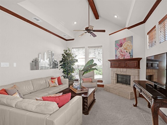 carpeted living area featuring visible vents, beam ceiling, a stone fireplace, recessed lighting, and high vaulted ceiling