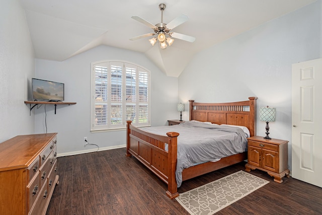 bedroom with lofted ceiling, baseboards, dark wood-style flooring, and ceiling fan