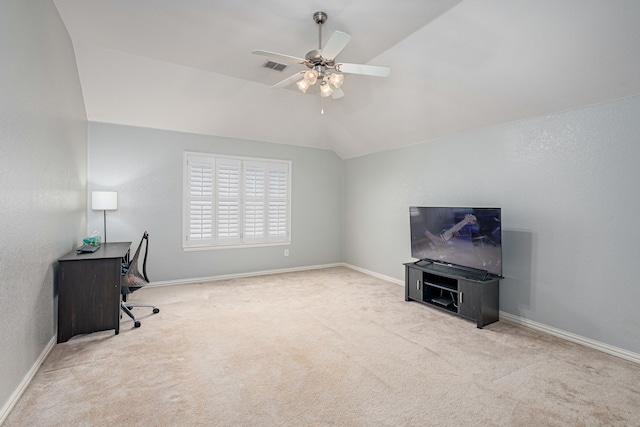 home office featuring baseboards, visible vents, carpet floors, lofted ceiling, and ceiling fan