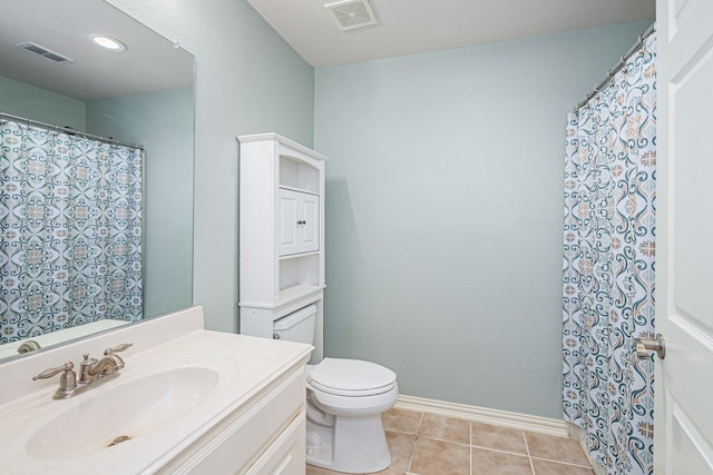 full bath with vanity, tile patterned floors, toilet, and visible vents