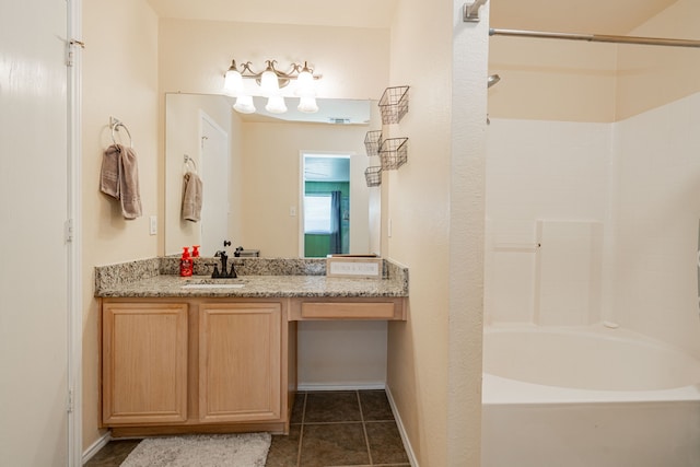 full bath with tile patterned floors, visible vents, tub / shower combination, baseboards, and vanity