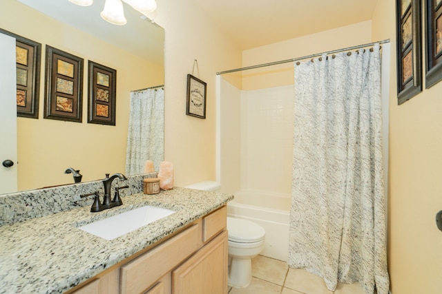 full bathroom featuring tile patterned floors, shower / tub combo with curtain, toilet, and vanity