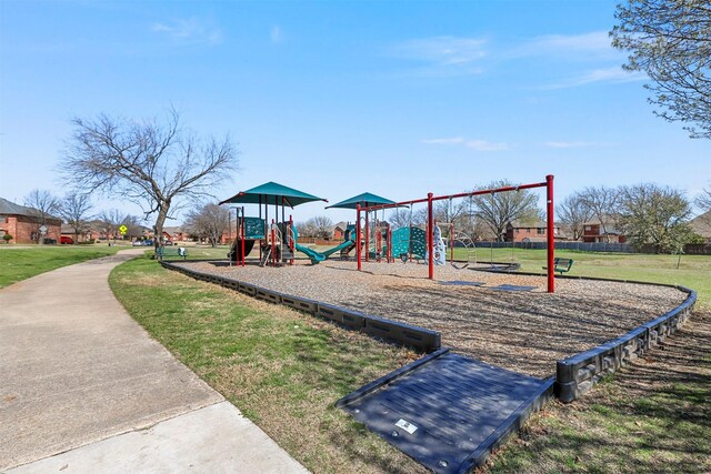 communal playground with a lawn