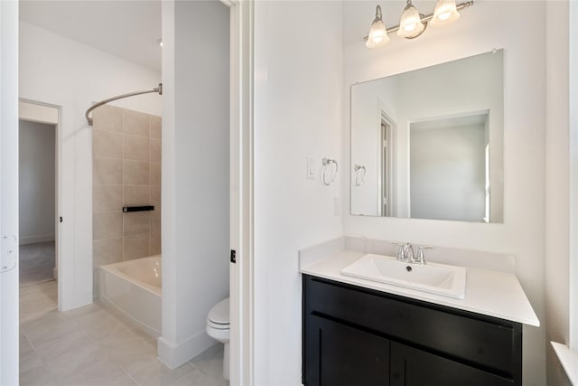 full bath with shower / bathtub combination, toilet, vanity, and tile patterned flooring