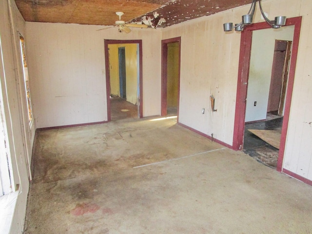 empty room featuring unfinished concrete floors