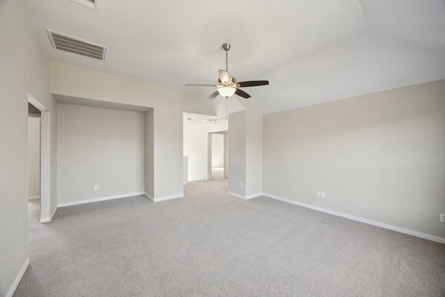 unfurnished bedroom with visible vents, baseboards, carpet floors, vaulted ceiling, and a ceiling fan