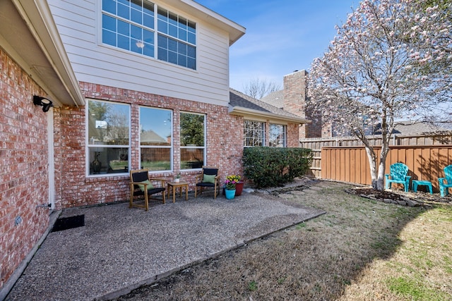 view of patio / terrace with fence