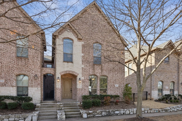 view of front of property with brick siding