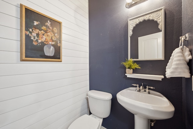 bathroom with a sink and toilet