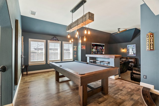 rec room featuring billiards, wood finished floors, visible vents, and vaulted ceiling