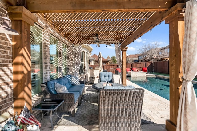 view of patio featuring an outdoor living space, a pergola, and a fenced backyard