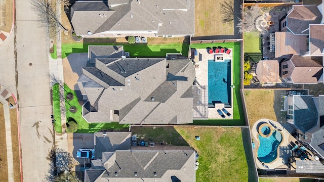 birds eye view of property with a residential view