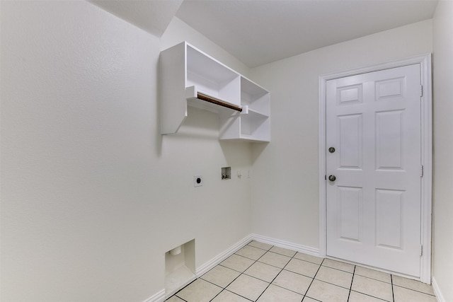 clothes washing area featuring electric dryer hookup, light tile patterned flooring, baseboards, hookup for a washing machine, and laundry area