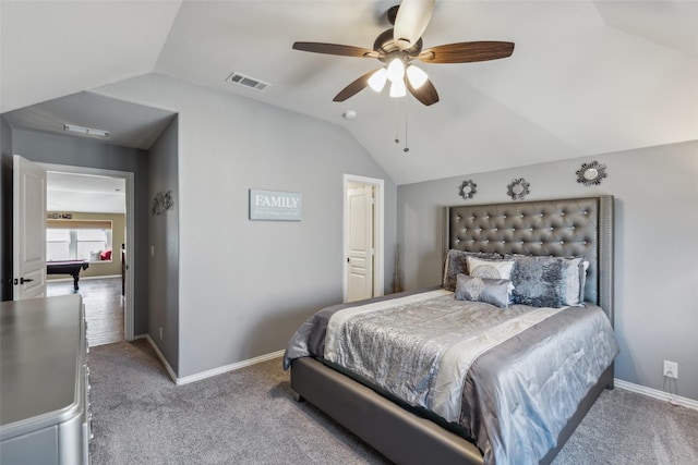 carpeted bedroom with visible vents, baseboards, ceiling fan, and vaulted ceiling