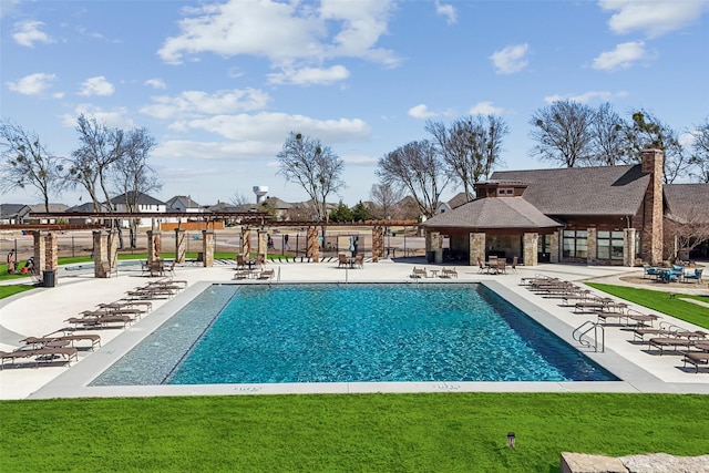 pool with a gazebo, a lawn, a patio, and fence