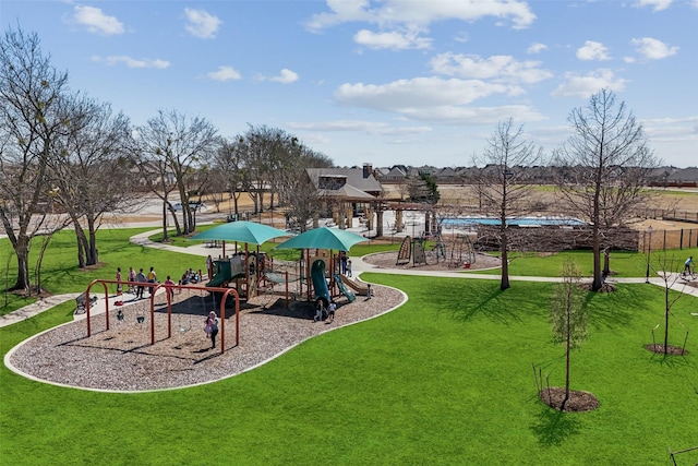 view of community featuring a lawn and playground community