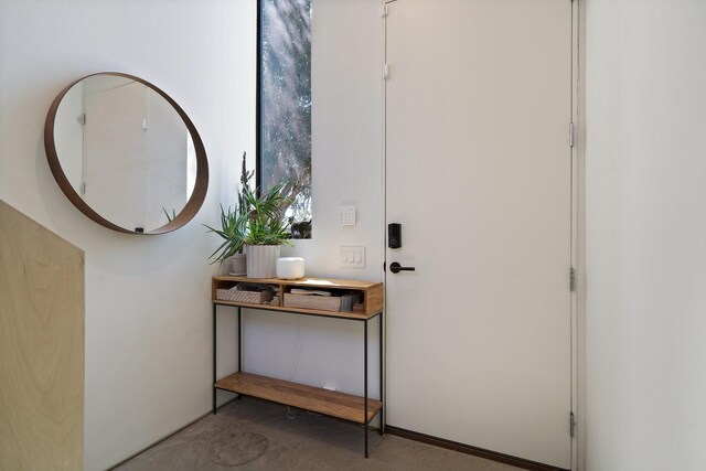 doorway with concrete floors