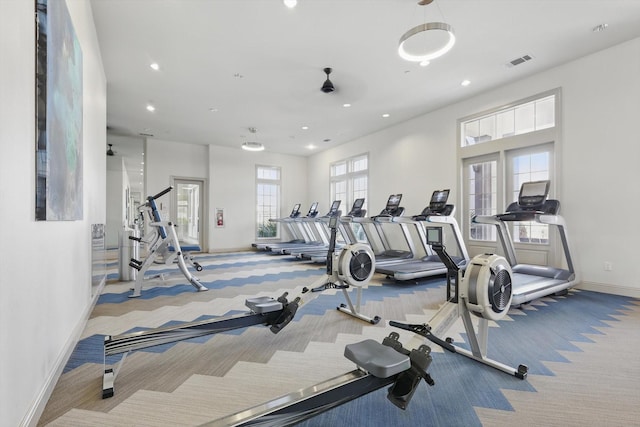 workout area featuring recessed lighting, baseboards, visible vents, and carpet floors