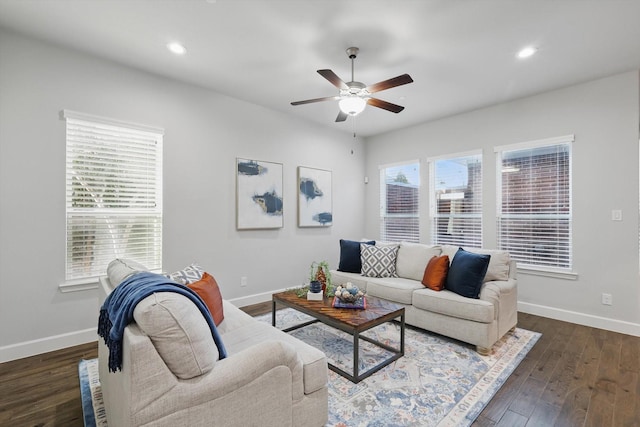 living area with a ceiling fan, recessed lighting, baseboards, and dark wood-style flooring