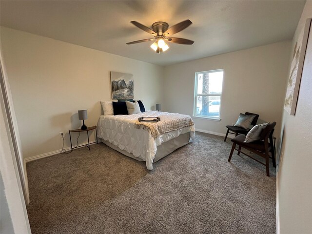 carpeted bedroom with a ceiling fan and baseboards