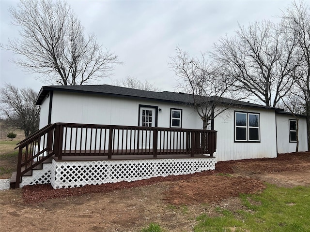 view of front of home with a wooden deck