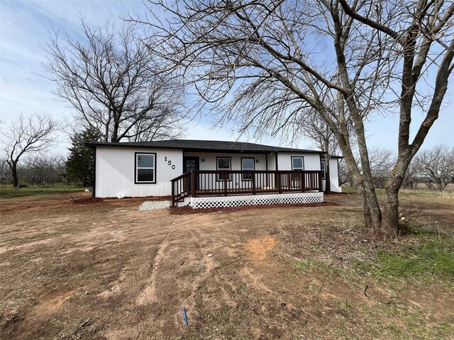 view of front of property with a wooden deck