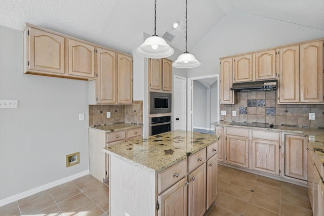 kitchen featuring visible vents, light brown cabinets, under cabinet range hood, appliances with stainless steel finishes, and light stone countertops