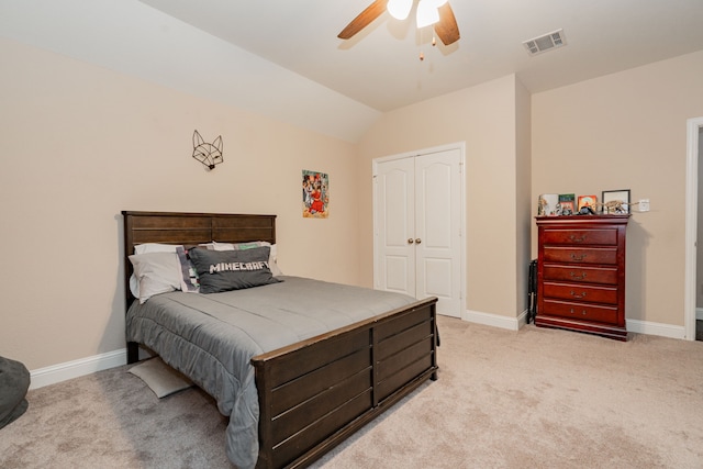 bedroom featuring carpet, visible vents, a closet, and baseboards