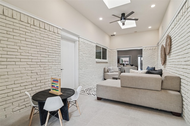 view of patio with an outdoor living space, visible vents, outdoor dining space, and a ceiling fan