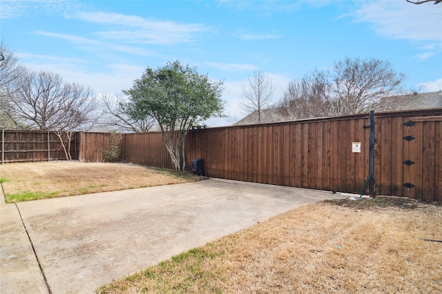 view of yard featuring a gate and fence